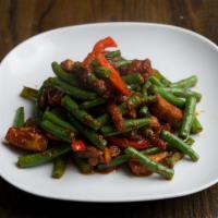 B5. Prik King · Sauteed with garlic, chili paste, green bean, carrot, and bell pepper in homemade sauce. Spi...