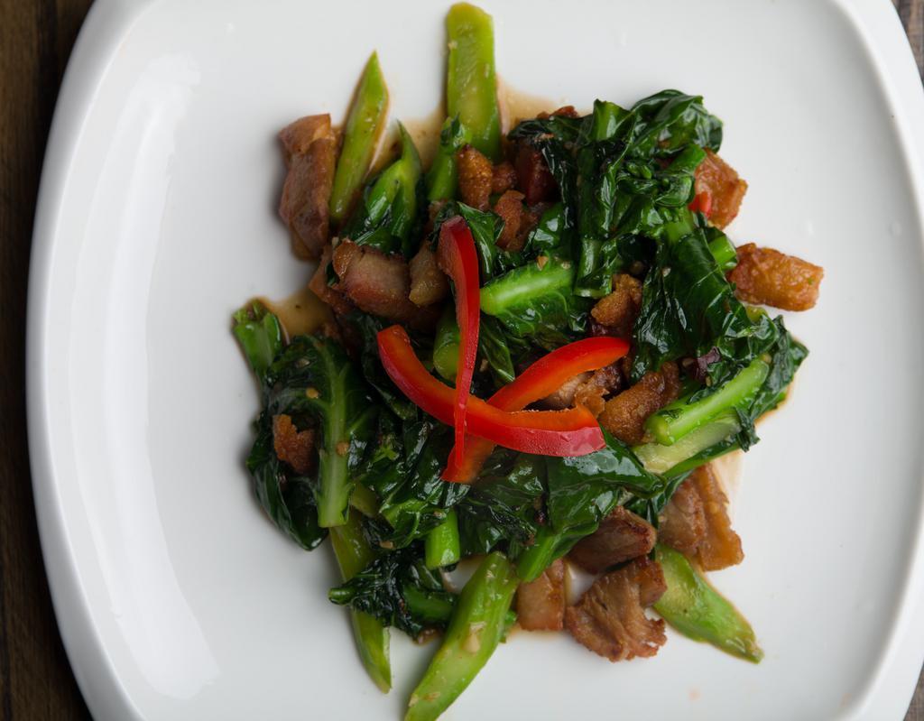 H2. Crispy Pork with Chinese Broccoli · Sauteed fried crispy pork belly with chili, Chinese broccoli, and bell pepper in the sauce. Served with rice. Spicy