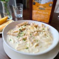 Pasta Alfredo · Creamy fettuccine made with butter, cream and spices. With a grilled chicken.