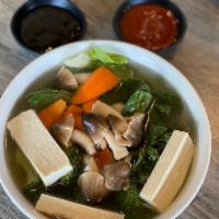 23. Mixed Vegetables Noodle Soup · Bac choy, broccoli, mushroom, tofu, and carrot. Comes with vegetarian broth.