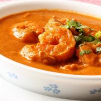 Shrimp Tikka Masala · Peeled jumbo shrimp grilled in tandoori oven and sauteed again in chef's special tikka masal...