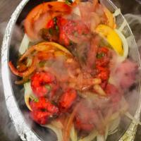 Shrimp Tandoori · Peeled jumbo shrimp marinated with yogurt, peeled tomato, 