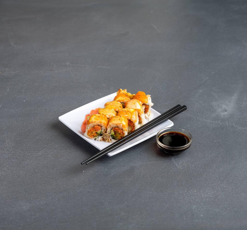19. Phoenix Special Roll · Comes with tempura shrimp, spicy tuna and avocado inside, lemon and salmon on top. Spicy.