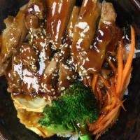 Teriyaki Chicken Bowl · Rice, Chicken, teriyaki sauce and 2 pcs pot stickers, broccoli, carrot