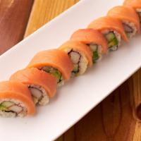Salmon Dragon Roll   · Inside -  avocado, cucumber, crab meat.
Topped - salmon