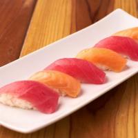 Nigiri  (Tuna 3 pcs+ Salmon 3 pcs) · fish over rice