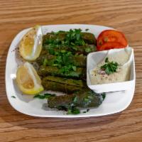  Stuffed Grape Leaves  · Grape leaves filled with ground beef or veggies, rice, mint and a hint of lemon. 