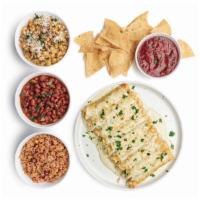 Enchiladas for 4 · Nine enchiladas, 3 Texas Size Sides. Served with chips and salsa.