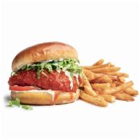 Buffalo- 806-983 CAL. · Breaded rotisserie chicken breast, flash-fried and tossed in tangy buffalo sauce, topped wit...