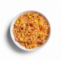 Spanish Rice · Bold flavors with roasted corn and our proprietary chicken seasoning.