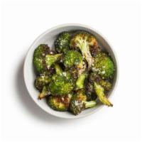 Roasted Broccoli · Roasted florets seasoned with tangy lemon, pepper, and topped with Parmesan.