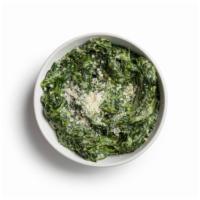 Creamed Spinach · Rich, creamy, and topped with Parmesan.

