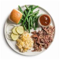 Brisket Plate · 1/4 lb. pulled brisket. Served with 2 sides and a roll.