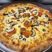 Cheesesteak Pizza · Topped with rib eye steak, sauteed onion and peppers, then smothered with a cheddar cheese b...