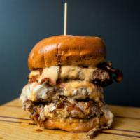 The Boss Burger · Mild cheddar, jack cheese, cheese sauce, bacon and Boss sauce. Choice of three 1/3 lb. patti...