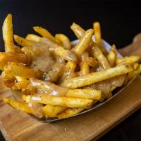 Gravy Fries · Fries covered with house-made gravy, made with chicken, beef & pork.