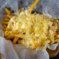 Four Cheese Fries · Fries covered in brie, feta, Parmesan and cheese sauce. Vegetarian.