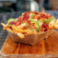 Bacon Cheese Fries · Fries, cheese sauce, bacon, green onion and jalapeno. Spicy.