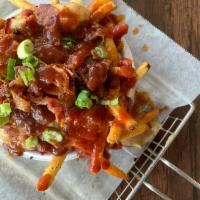 J'Ville Local's Poutine · 33 Peppers Datil Spice Blend Seasoned Fries covered with Wainright Dairy Cheese Curds, House...
