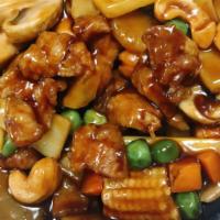 Cashew Chicken · Diced chicken sauteed with crispy cashew nuts, mushroom, green peas, green onion, celery and...