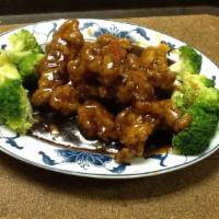General Tso's Chicken · Large chunks of crispy boneless chicken sauteed in chef's special brown sauce and served wit...