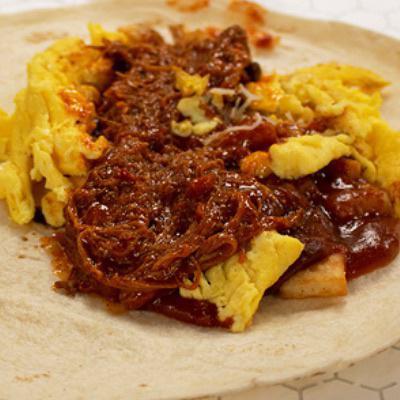 #07 (Rio Grande) · Carne adovada, egg, potatoes, red chile and cheese. 650 calories.
