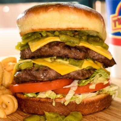 (RENEGADE Burger) · Grilled bun, 2 X chopped green chile,2 X  cheese, lettuce, tomato, pickles, mustard and ketchup. Made with two 100% all Angus beef patties.