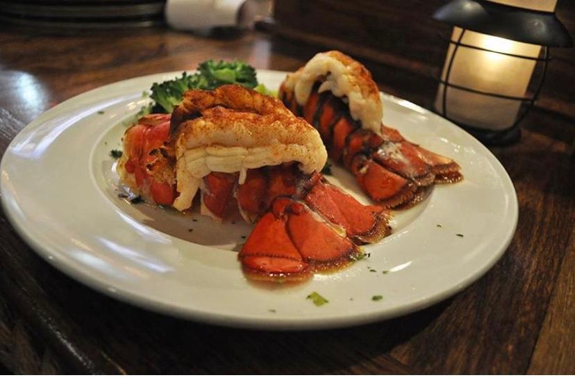 Twin Lobster Tails · two 6oz lobster tails with a choice of side