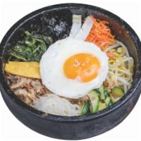 8. Mixed Rice (Bibimbap) · Mixed rice with vegetables and beef. 
