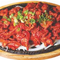 30. Pork Bulgogi  · Pork meat marinated in spicy sauce. 