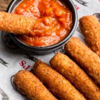 Mozzarella Sticks · Fried in oil. Served with a side of marinara. 