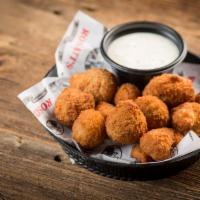 Breaded Mushrooms · Served with a side of ranch dressing.