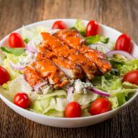 Buffalo Chicken Salad · Romaine and iceberg lettuce, spinach leaves, crispy chicken breast tossed in Buffalo sauce, ...