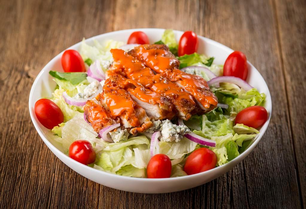 Buffalo Chicken Salad · Romaine and iceberg lettuce, spinach leaves, crispy chicken breast tossed in Buffalo sauce, grape tomato, red onion and bleu cheese crumbles.