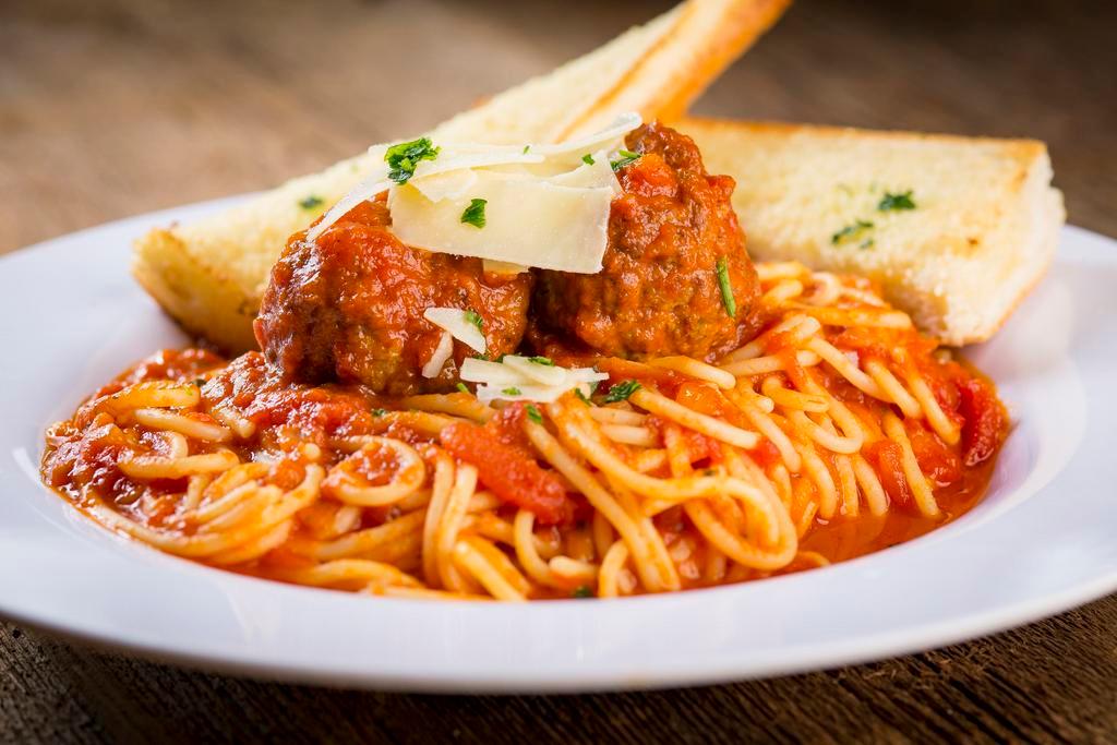 Spaghetti and Meatballs · Traditional spaghetti with marinara sauce served with homemade meatballs from the family recipe, topped with shaved Asiago cheese and fresh parsley.