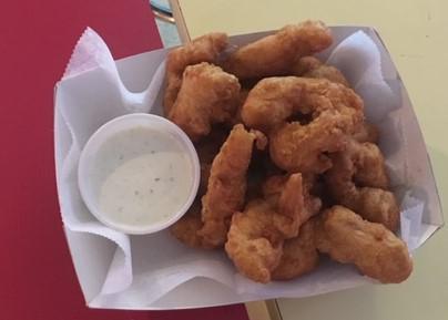 Beer Battered Chicken Strips · Thin strips of chicken breast coated in beer batter and fried golden brown. Served with honey mustard sauce.