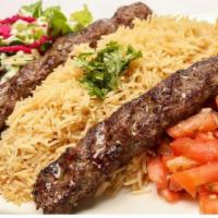 Beef Kofta Kebab · Prime ground beef marinated and seasoned with herbs and saffron spices, broiled over an open...