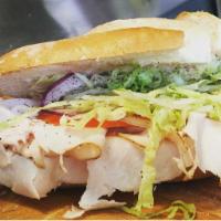 7. Turkey Breast Sandwich · Lettuce, tomatoes, onions, salt, pepper, oregano, oil and vinegar.