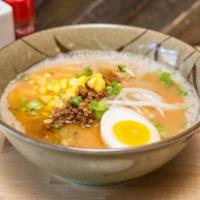 D2. Miso Ramen · Broth: miso based beef bone broth. Top: bean sprouts, corn, menma, grounded pork, miso egg a...
