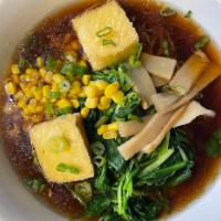 V1. Buddha Ramen · Shoyu (soy sauce) based vegetable broth topped with boiled spinach, bean sprouts, corn, aged...