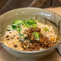 E1. Dan Dan Noodle · No soup. Shanghai style brothless noodle dish topped with grounded pork, bean sprouts, bokch...