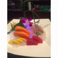 Sashimi Appetizer · 6 pieces of assorted raw fish.