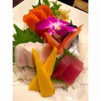 Chirashi Sushi Entree · Raw. 14 pieces sashimi: 2 tuna, 3 salmon, 3 white tuna, 3 mackerel, 1 shrimp, 1 egg omelet a...