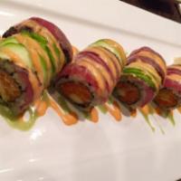 Dynamite Roll · Raw. Spicy tuna and mango wrapped inside out with pepper tuna and avocado on top, with honey...