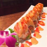 Paradise Roll · Raw. Spicy tuna, white tuna and avocado wrapped inside out with crunch spicy salmon lobster ...
