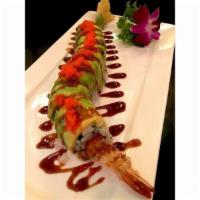 AK-47 Roll · Raw. Spicy tuna, shrimp tempura and avocado wrapped inside out with sesame and tobiko on top. 