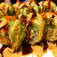 Double Dragon Roll · Inside lobster salad, asparagus wrapped with rice and seaweed, crunch, outside avocado with ...