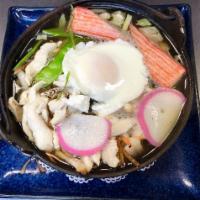Nabeyaki Udon · Personal-size hot pot udon soup with chicken, egg fish cake, crabstick, vegetables and 1 pie...