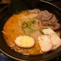 Spicy Beef Ramen · Tonkotsu pork bone based broth with roast beef slices, half soft boiled egg, beansprouts, fi...
