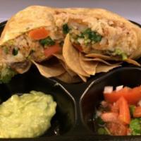 Veggie Burrito · Filled with grilled peppers, mushrooms, onions, tomatoes with rice, beans, lettuce, cheese, ...